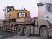 перевозка бульдозера по России автотранспортом